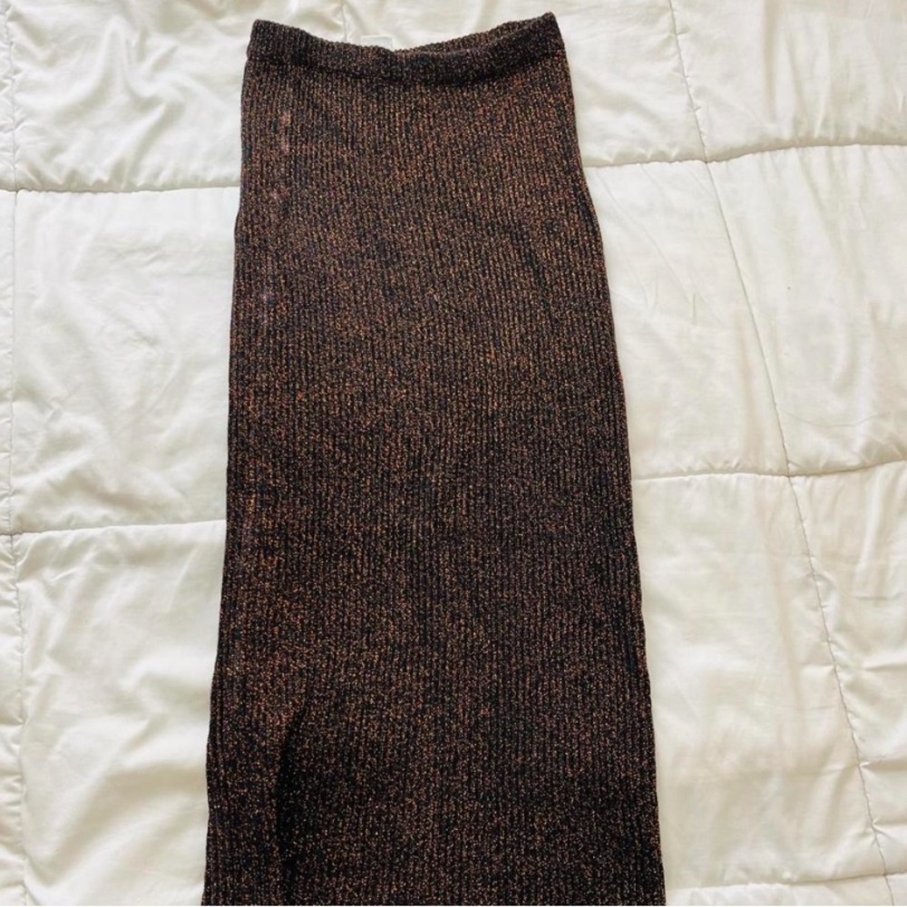 Orange shimmer on black skirt